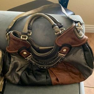 Guess by Marciano leather purse. Just needs to be cleaned